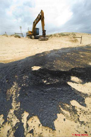 Oil slick on Kawana Beach, Sunshine Coast.